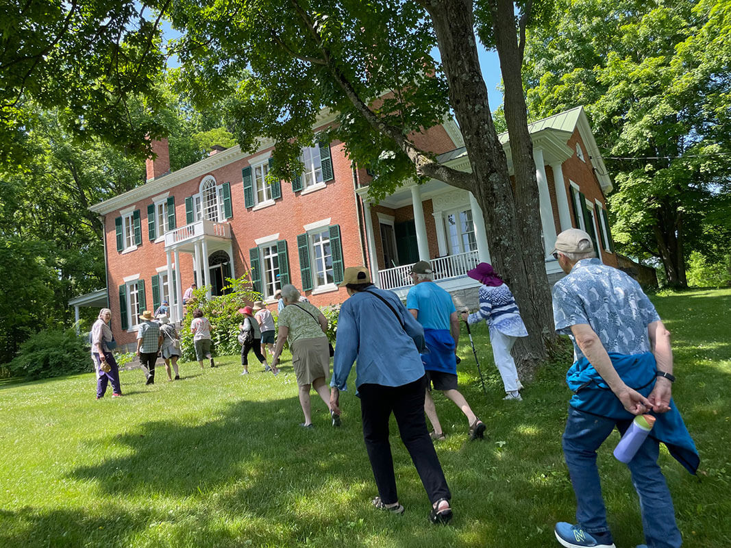 Tour Group A group on a Burlington History Tours Neighborhood tour